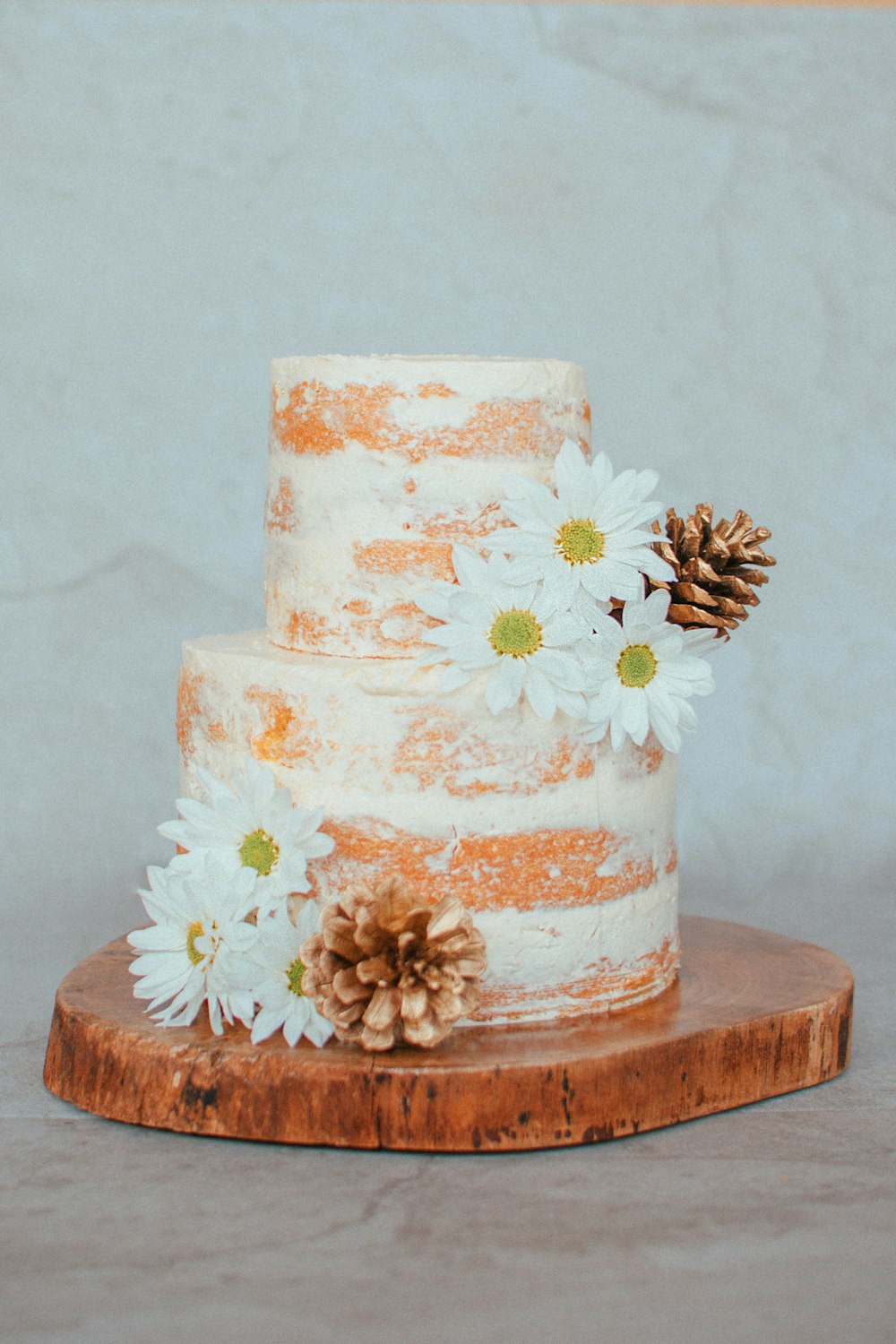 white and yellow floral 3 layer cake