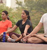 A peaceful therapy session focusing on breathing exercises with a small group.