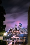 lighted sydney opera house during night time