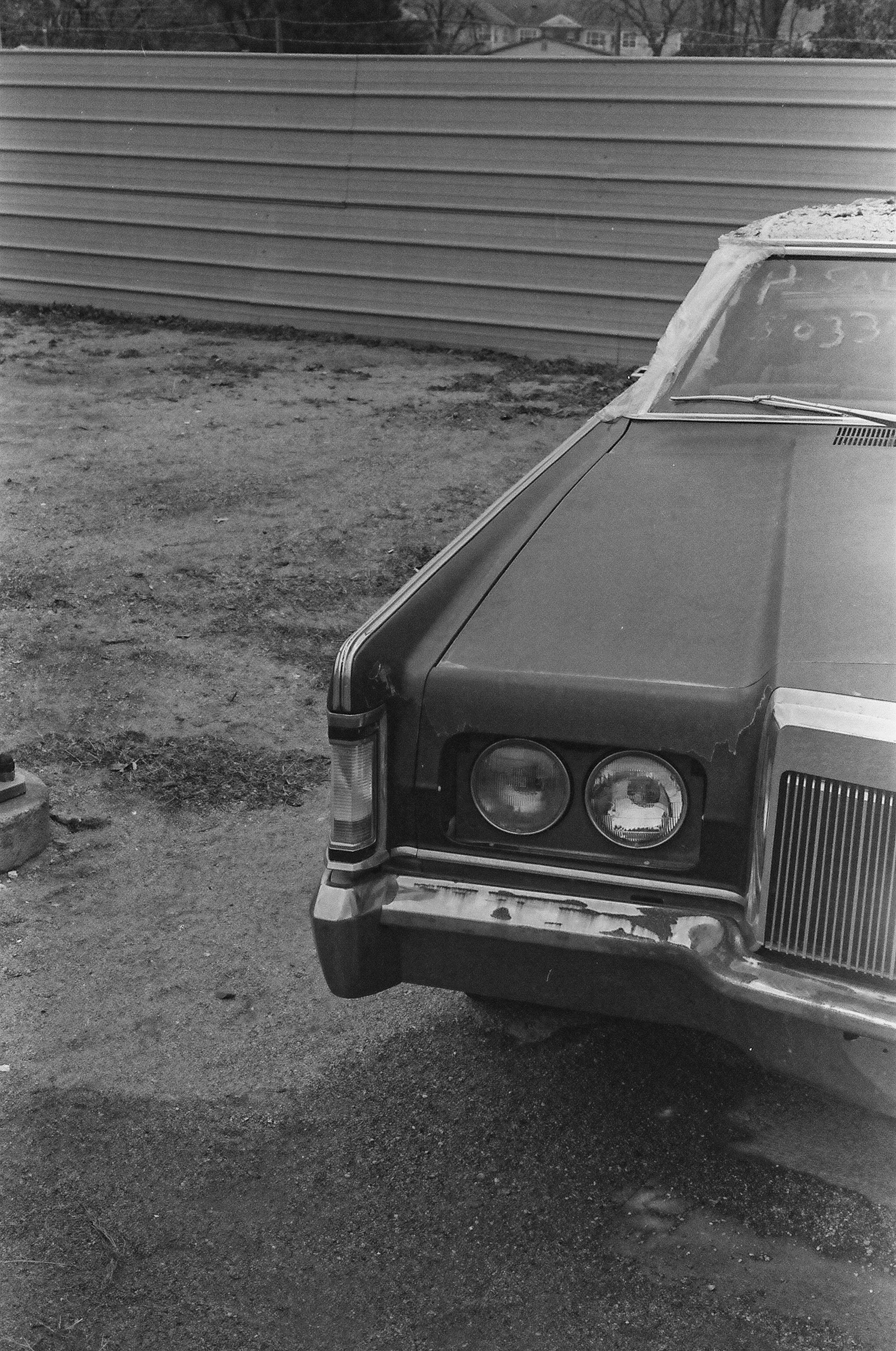 grayscale photo of car on road