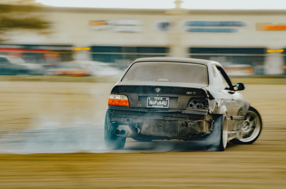 black bmw m 3 on road