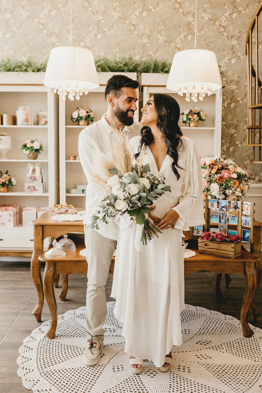 man and woman kissing on brown wooden table