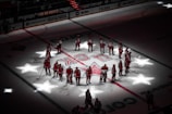 people playing ice hockey game