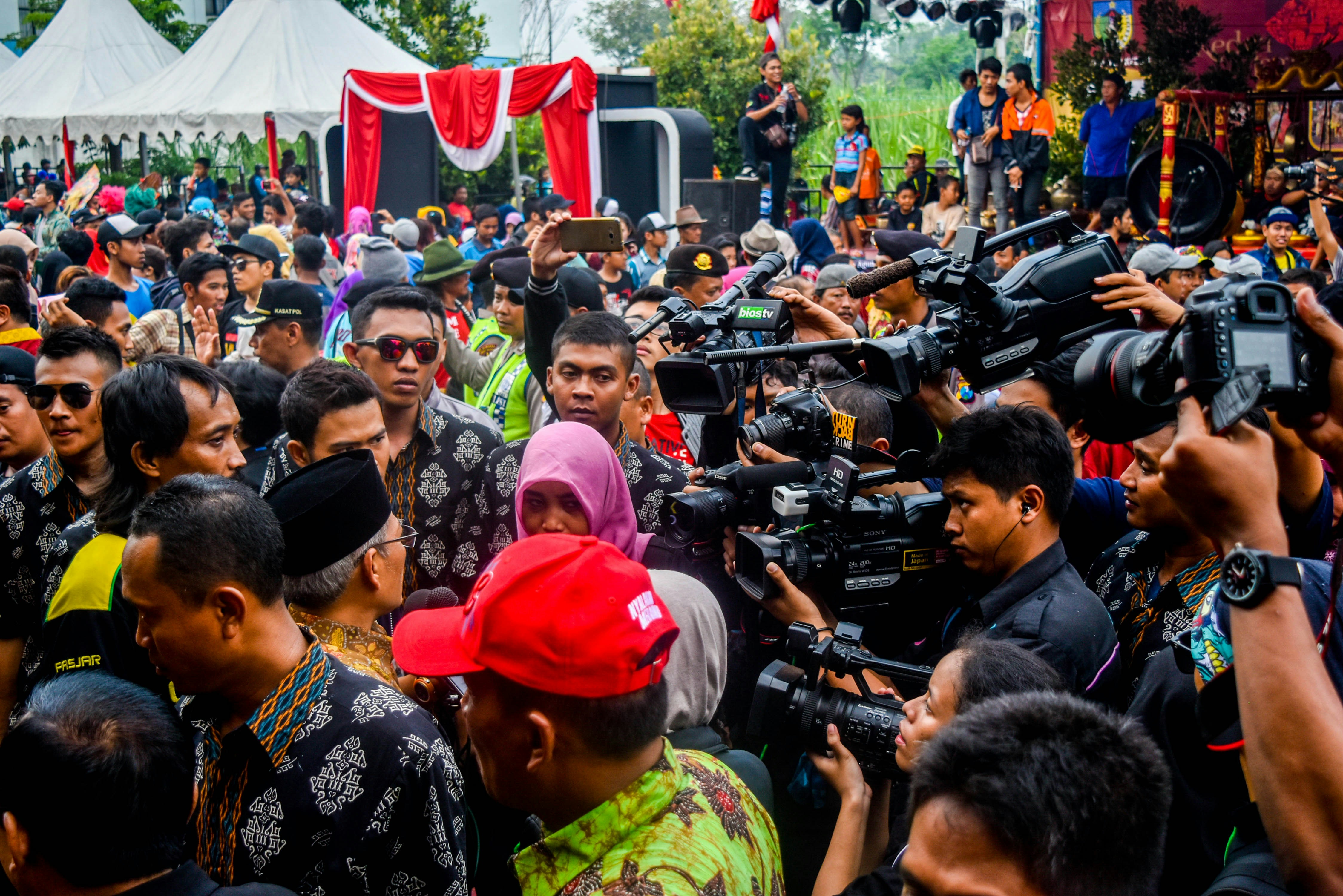 people sitting on motorcycle during daytime