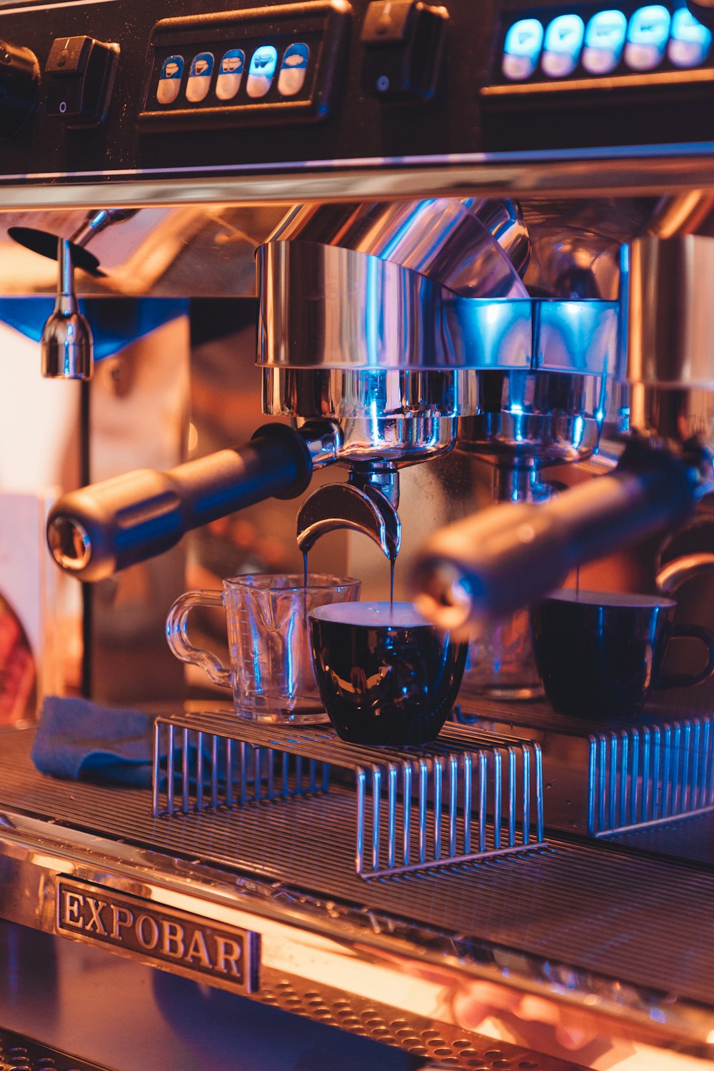 silver and black espresso machine