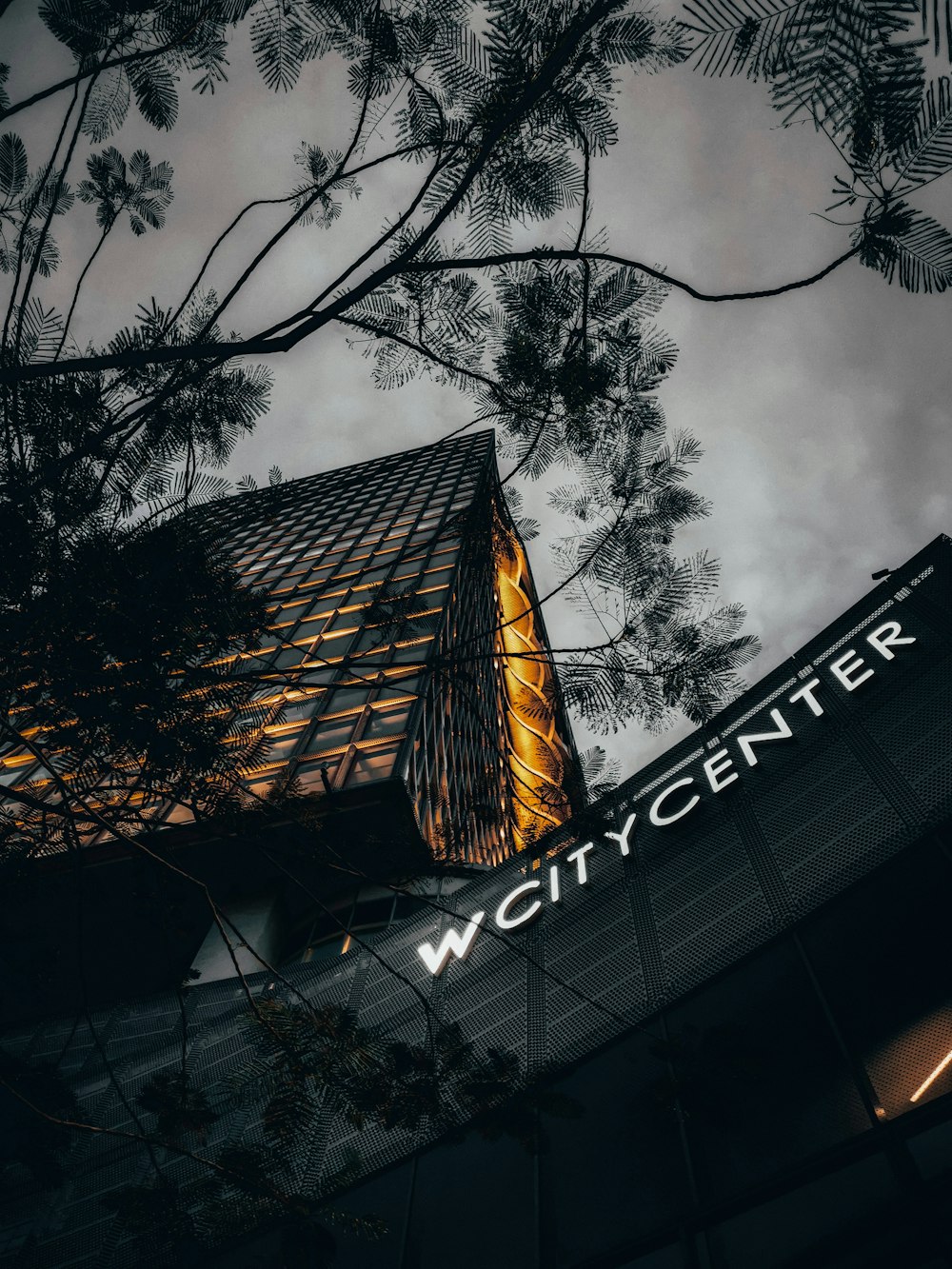 a tall building with a sky background