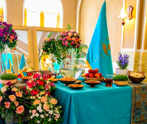 A festive table set with Bukharan dishes during a cultural event.