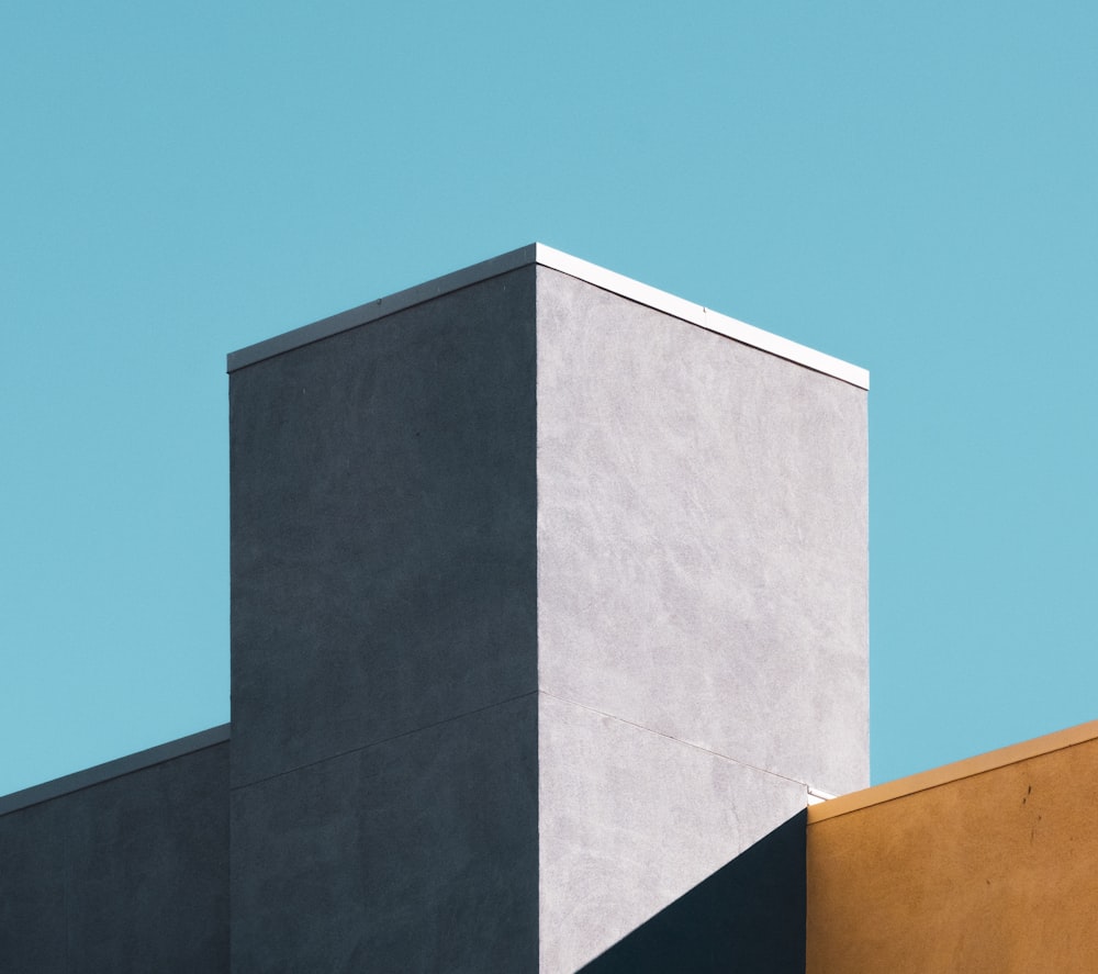 gray concrete building under blue sky during daytime