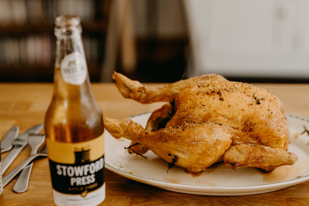 brown fried chicken on white ceramic plate