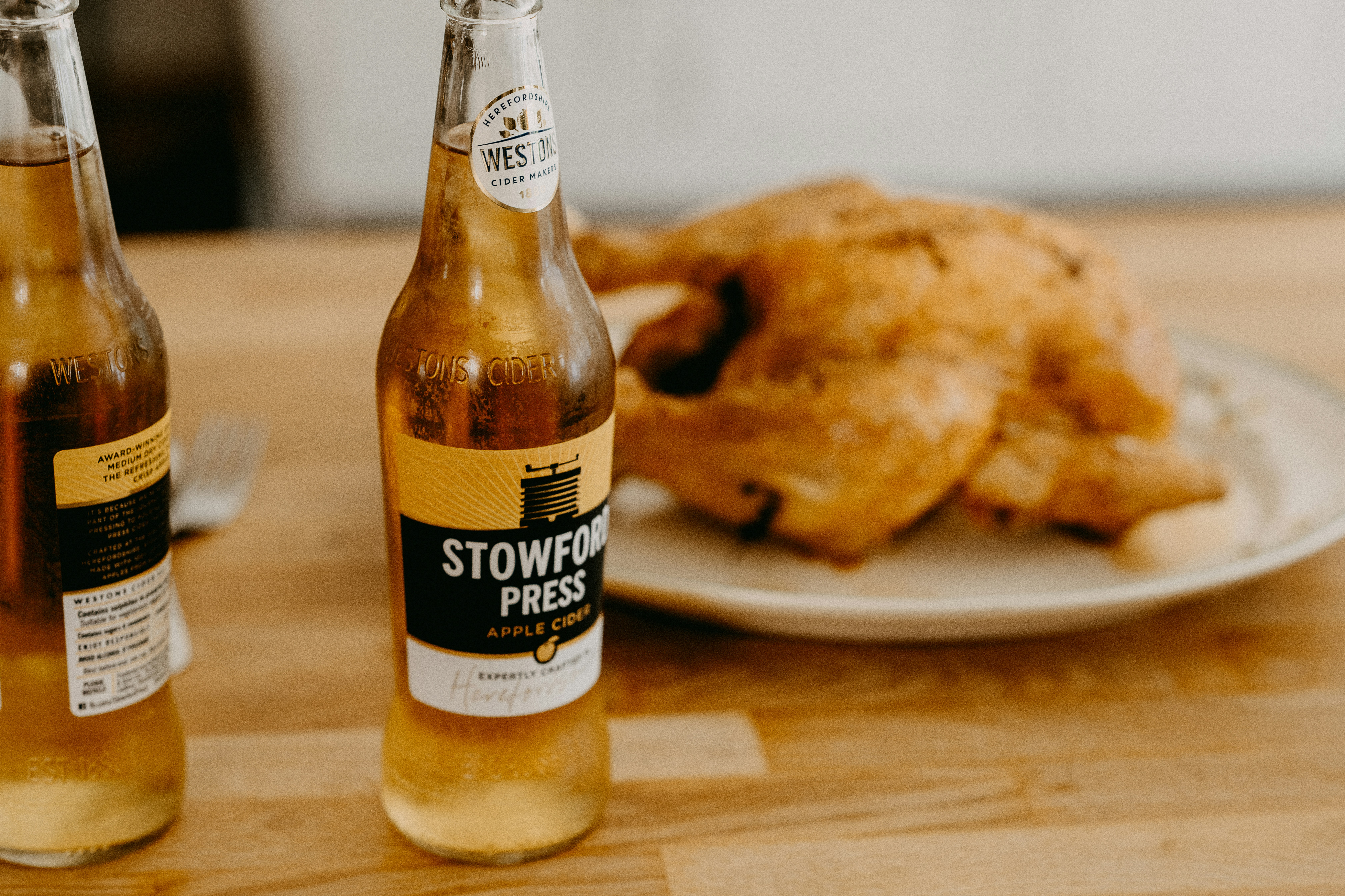corona extra beer bottle on brown wooden table