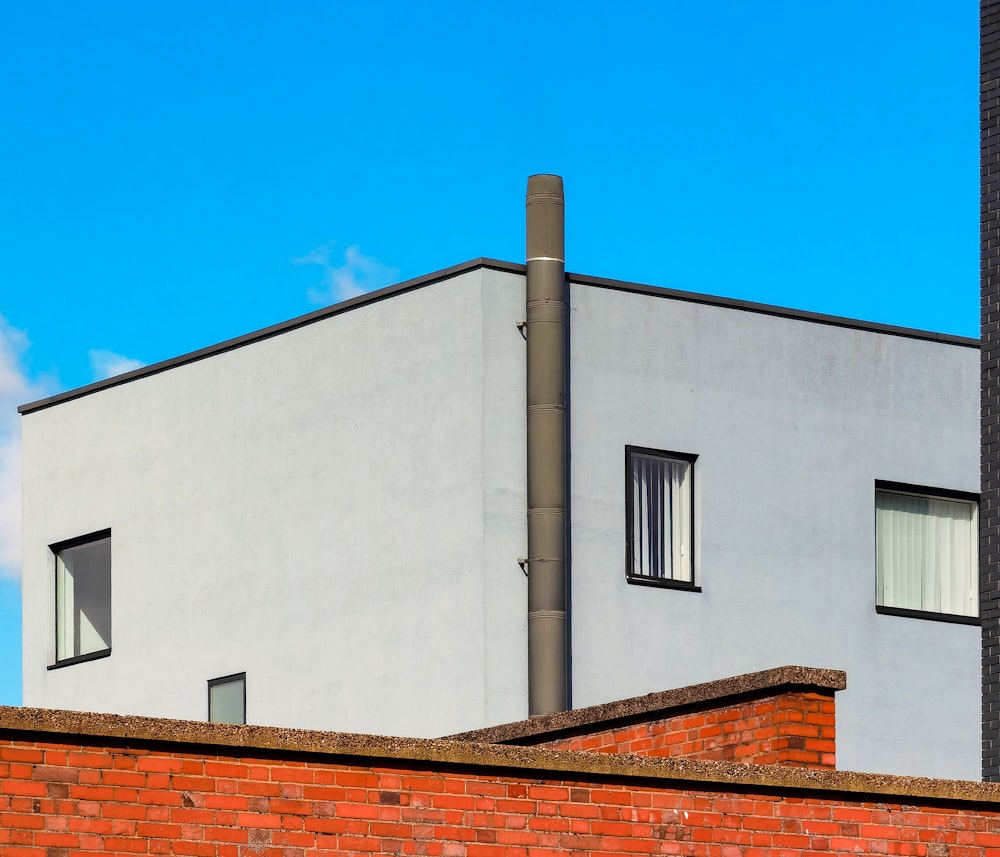 white concrete building under blue sky during daytime