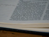Close-up of an open ebook displaying a captivating chapter from John M. W.'s latest novel.