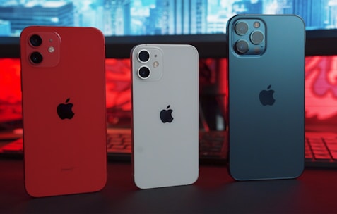 silver iphone 6 and red iphone case