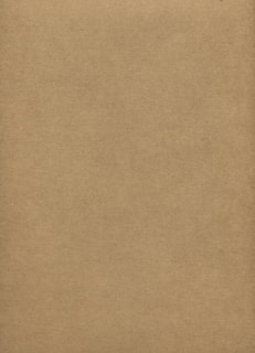 brown textile on brown wooden table