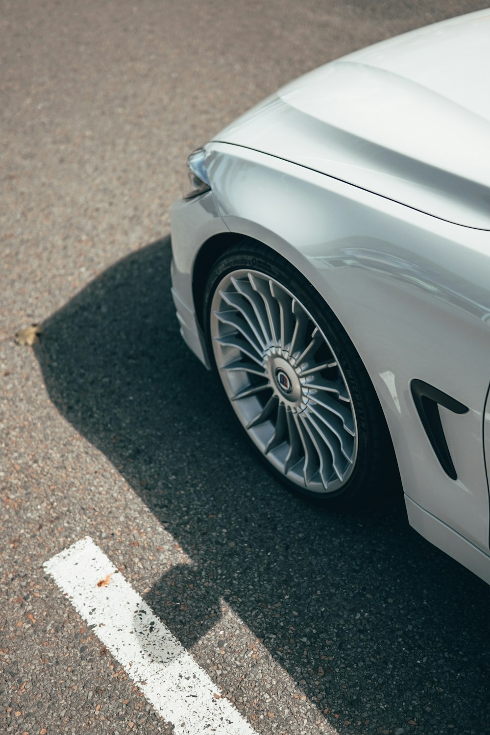 white porsche 911 on road during daytime