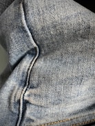 Close-up of sustainable denim fabric texture.