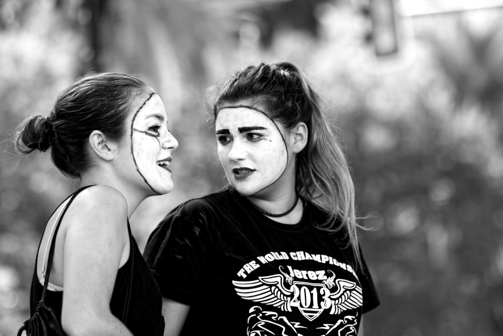 man in black crew neck t-shirt beside woman in black tank top