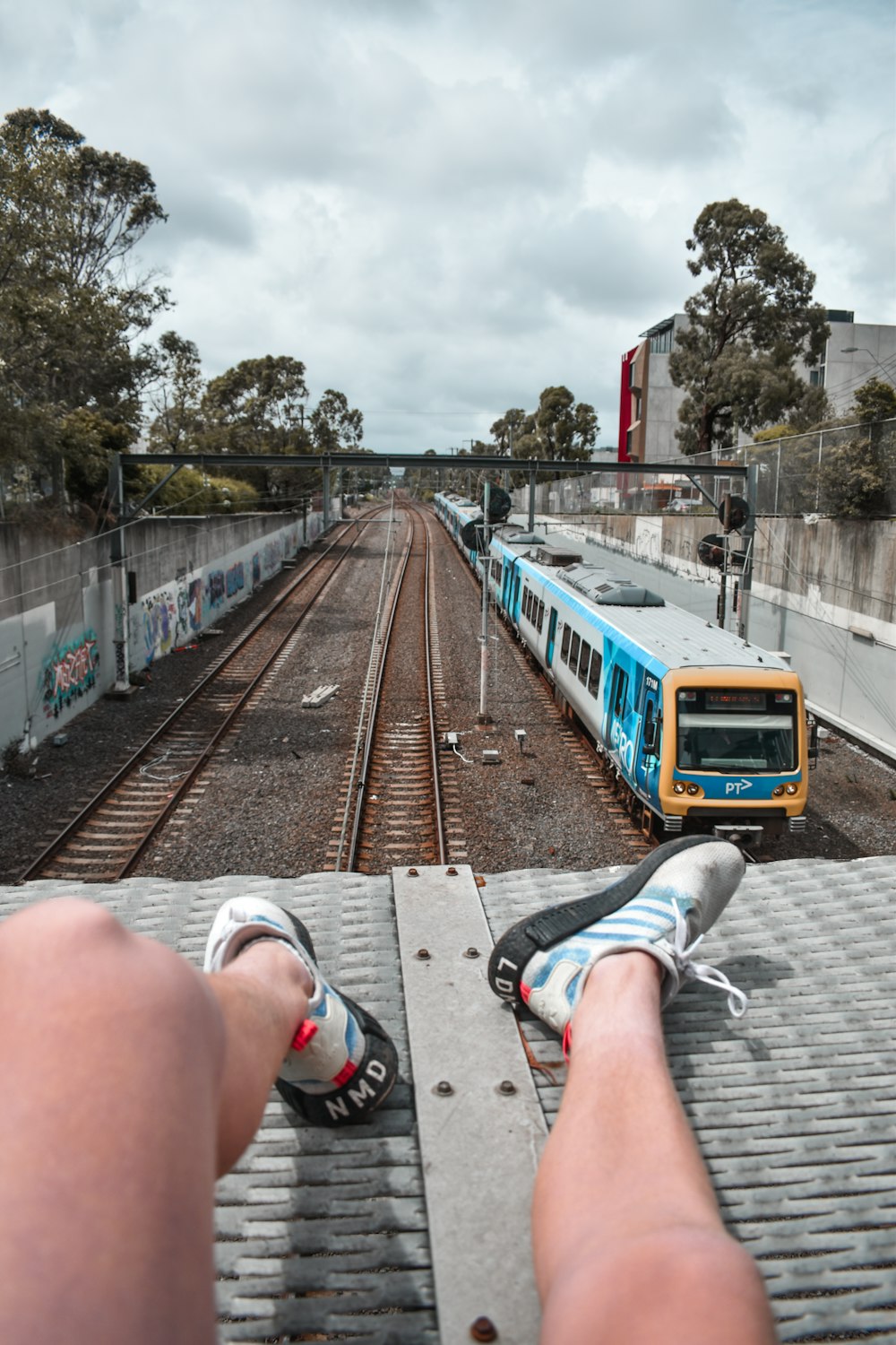 people sitting on train station during daytime