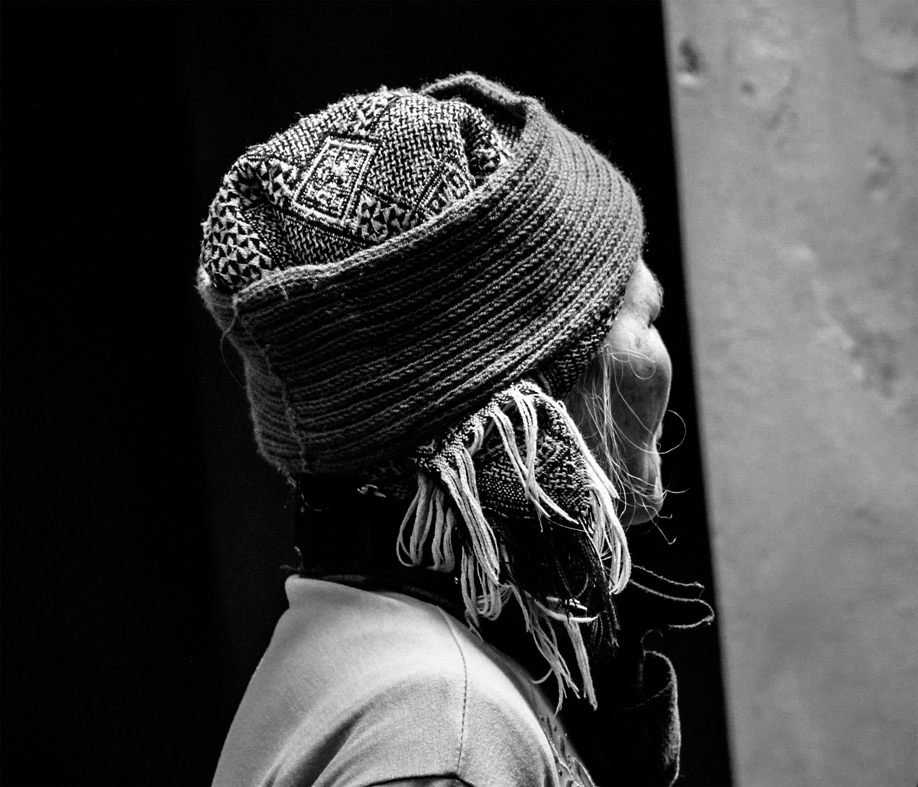 grayscale photo of woman wearing knit cap