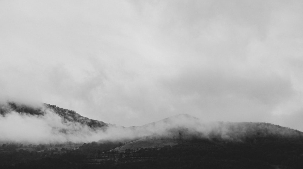 grayscale photo of mountain range