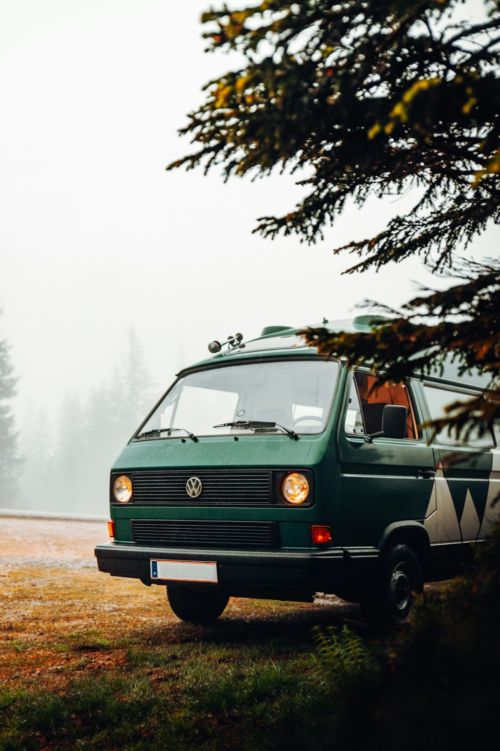 green volkswagen t-2 on road during daytime