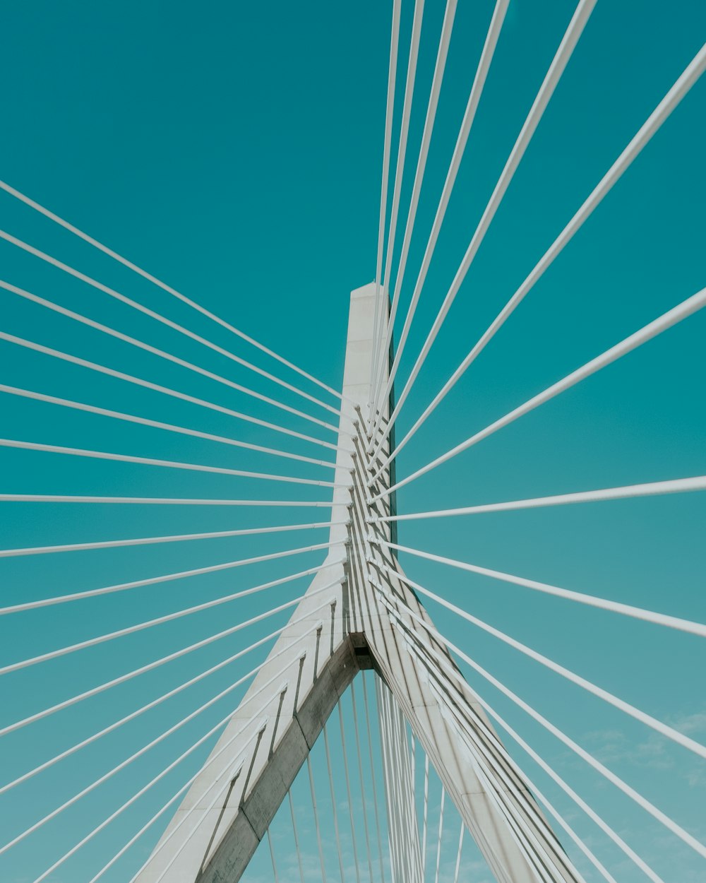 white metal bridge under blue sky during daytime