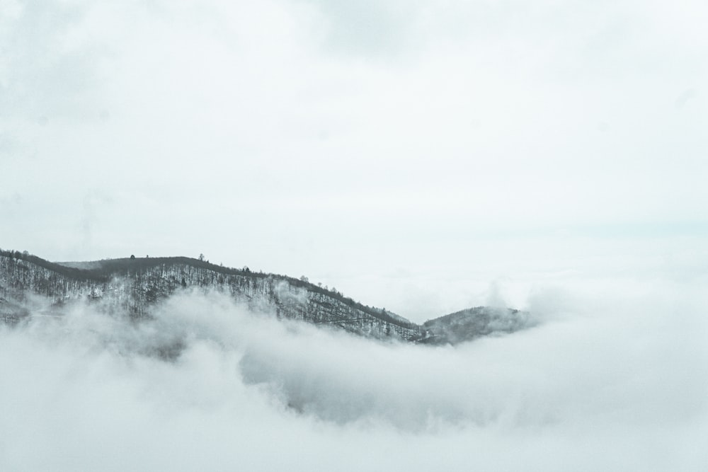 snow covered mountain during daytime