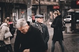 A photo of a group of people using the vote&go app in an urban setting.
