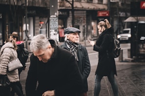 A group of friends enjoying a walk in the city.