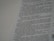 A close-up view of a page from a book, featuring text in a serif font. The text appears to be a narrative or dialogue, with numbered lines and a clear structure. The background is a pale color, likely the paper of the book.