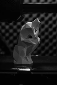 white and gray diamond on black surface