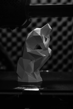 white and gray diamond on black surface