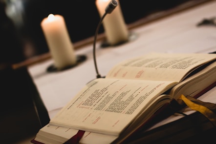 Close-up of the Pathway Consultancy booklet and audio player on a cozy table.