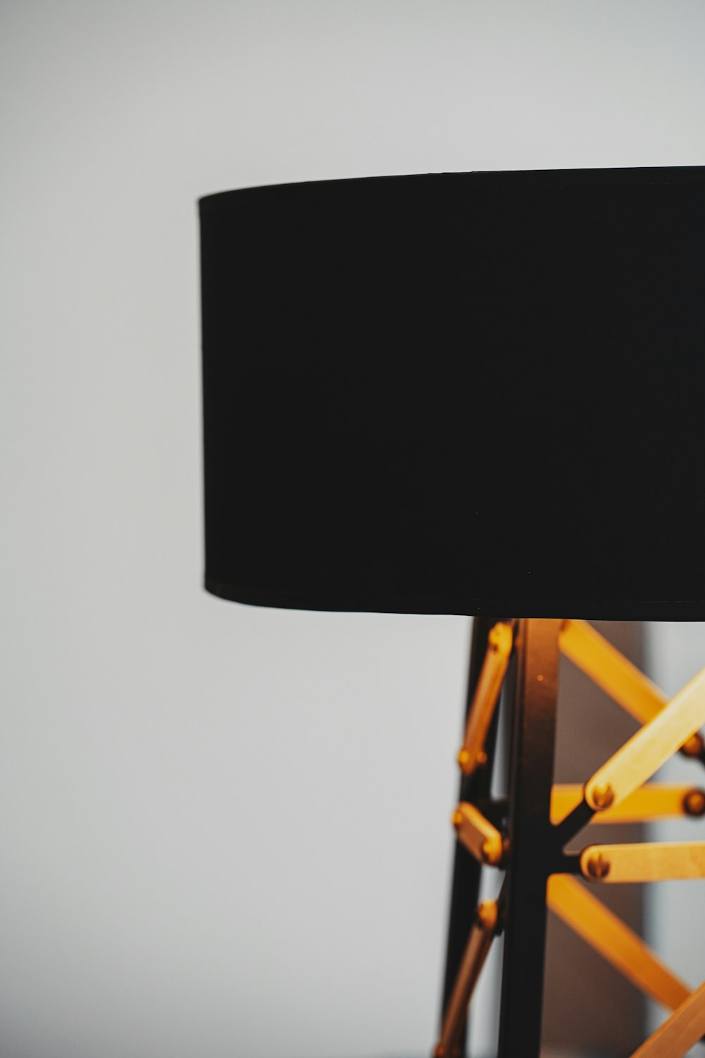 black table lamp on brown wooden table