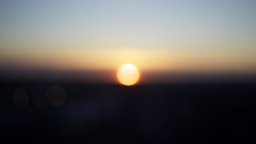 sun setting over the horizon