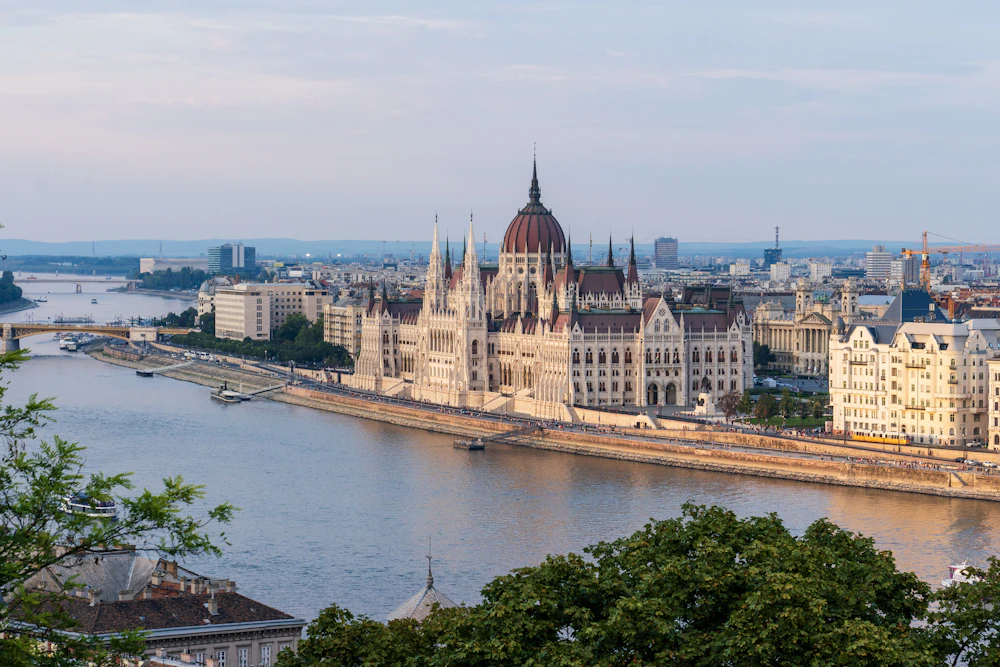 Budapest Parliament building reflected in the Danube on a Hungarian cultural school trip