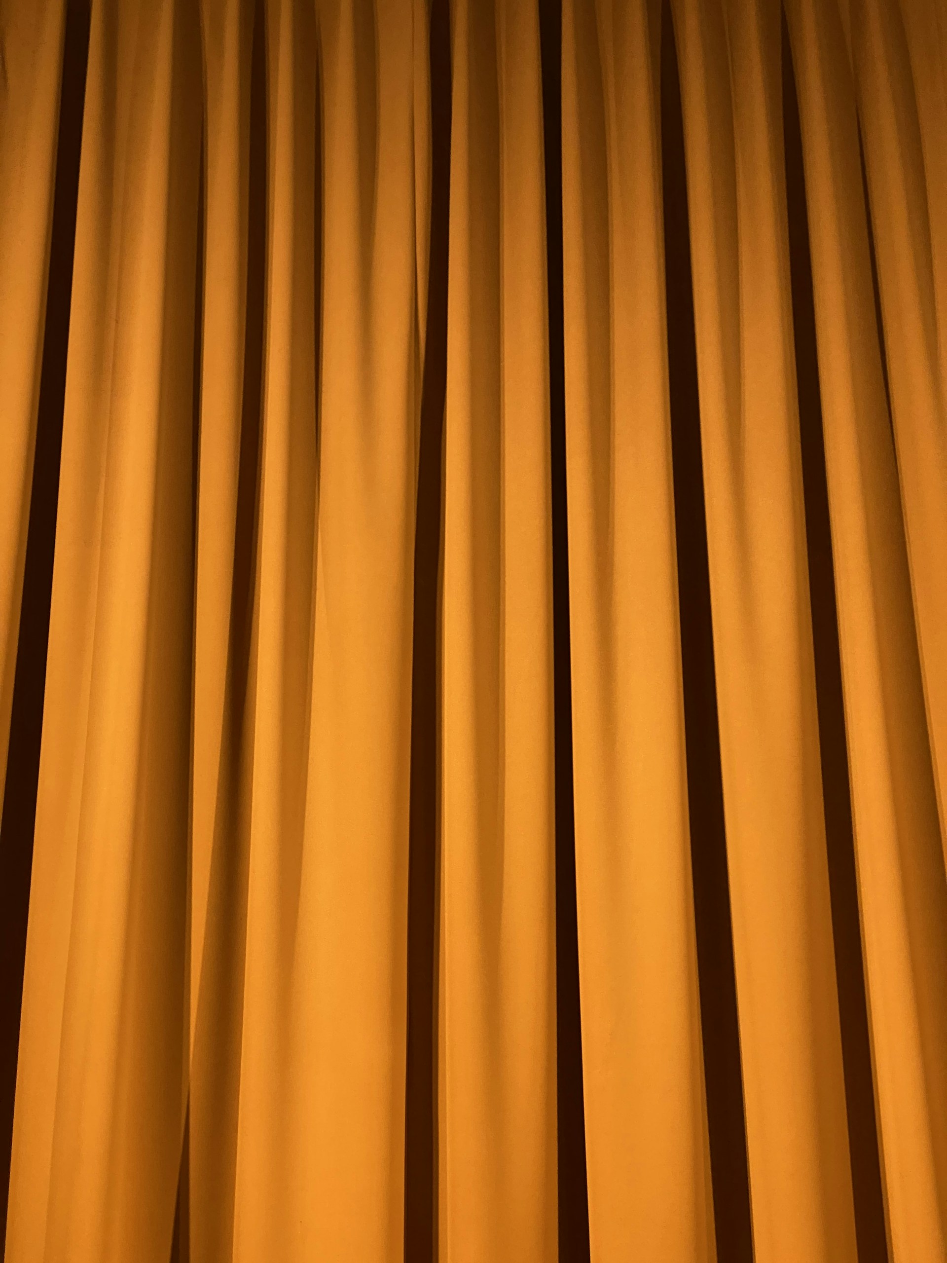 yellow curtain in close up photography