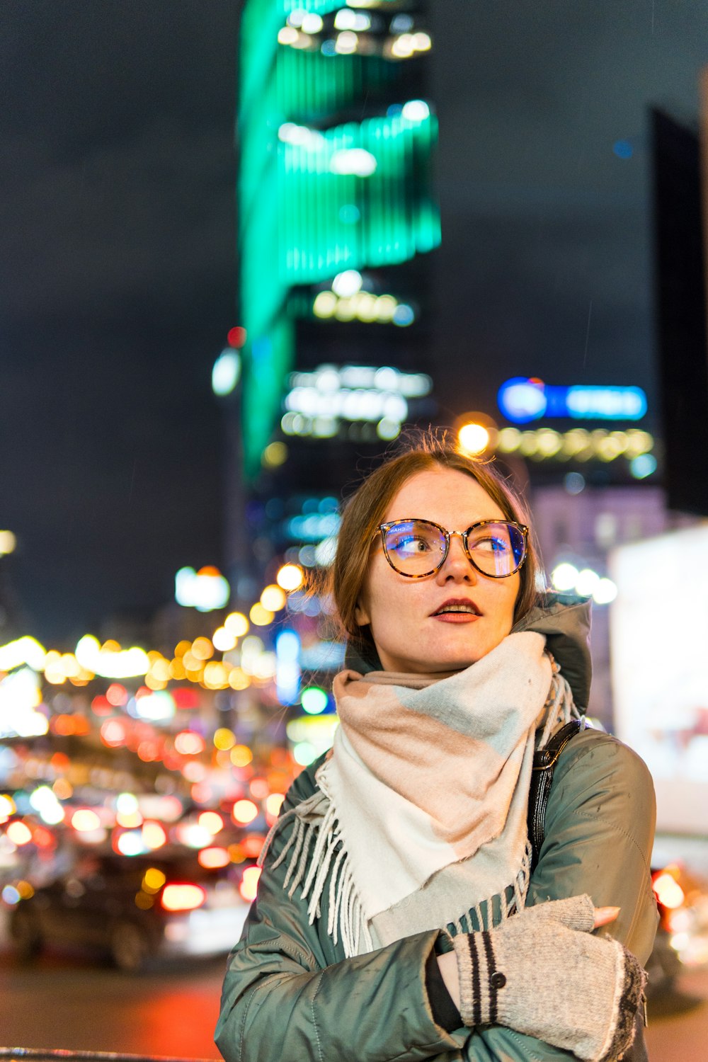 woman in black and white striped shirt wearing black framed eyeglasses