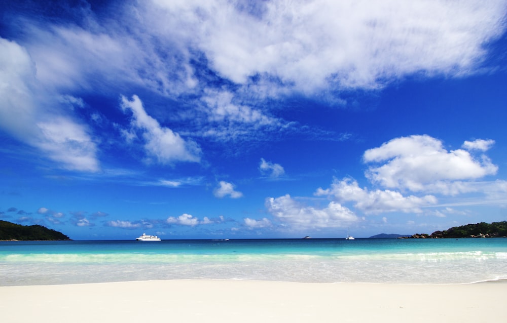 blue sky and white clouds over the sea