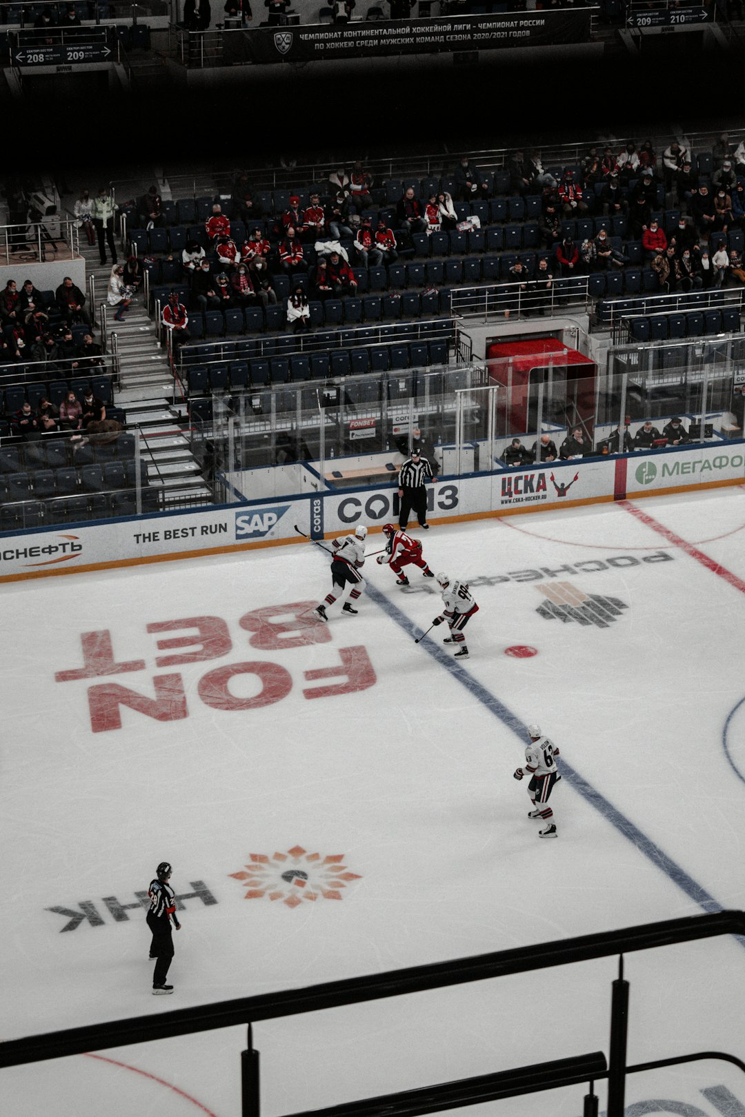 ice hockey players on ice hockey field