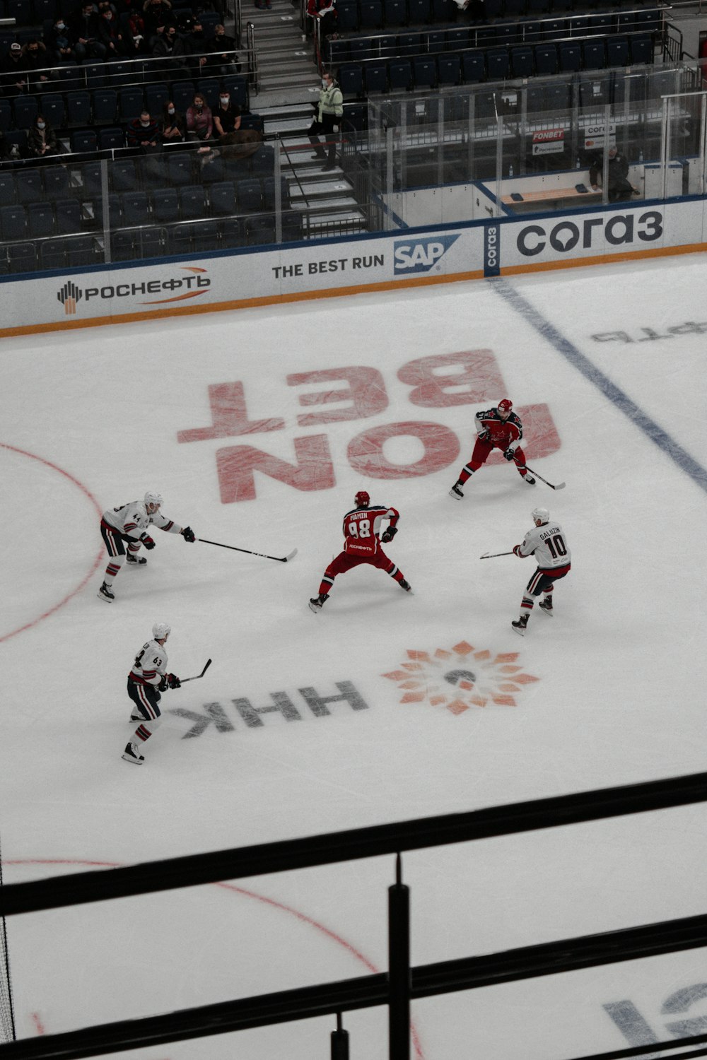 ice hockey players on ice hockey field