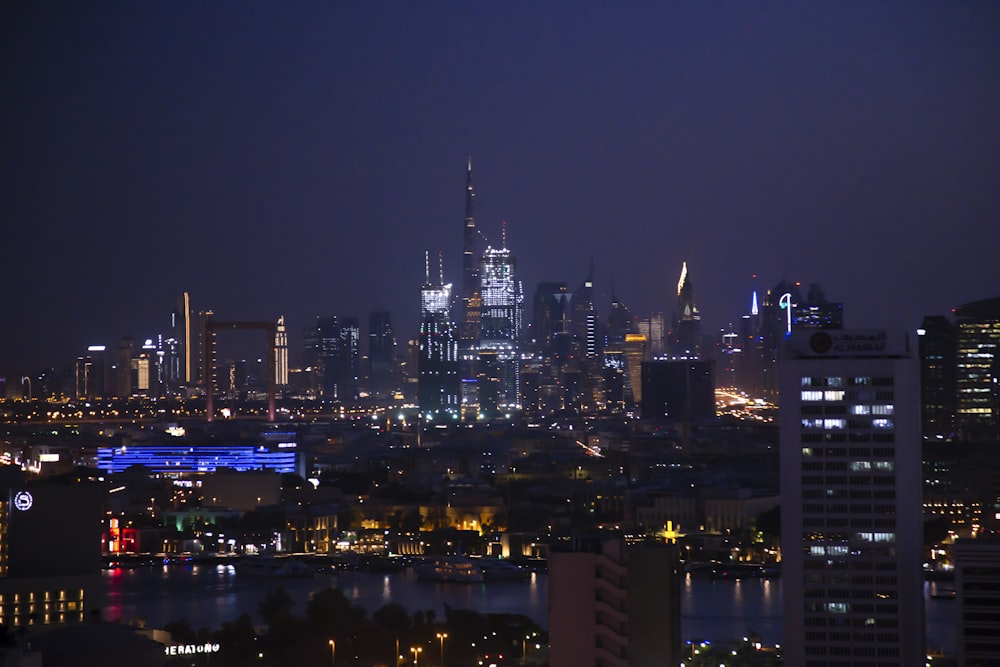 city skyline during night time