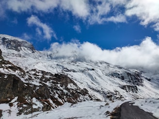 snow covered mountain under blue sky during daytime