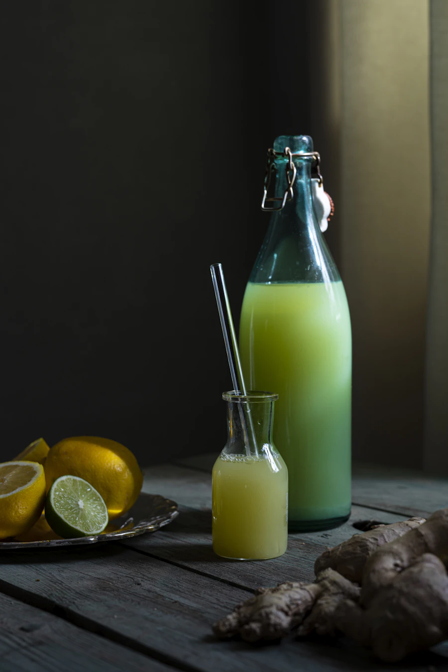 Glass bottle with a green plant-based drink