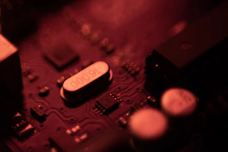 Close-up of a precision-engineered circuit board with intricate electronic components under soft lighting.