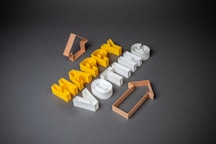 white and yellow plastic blocks