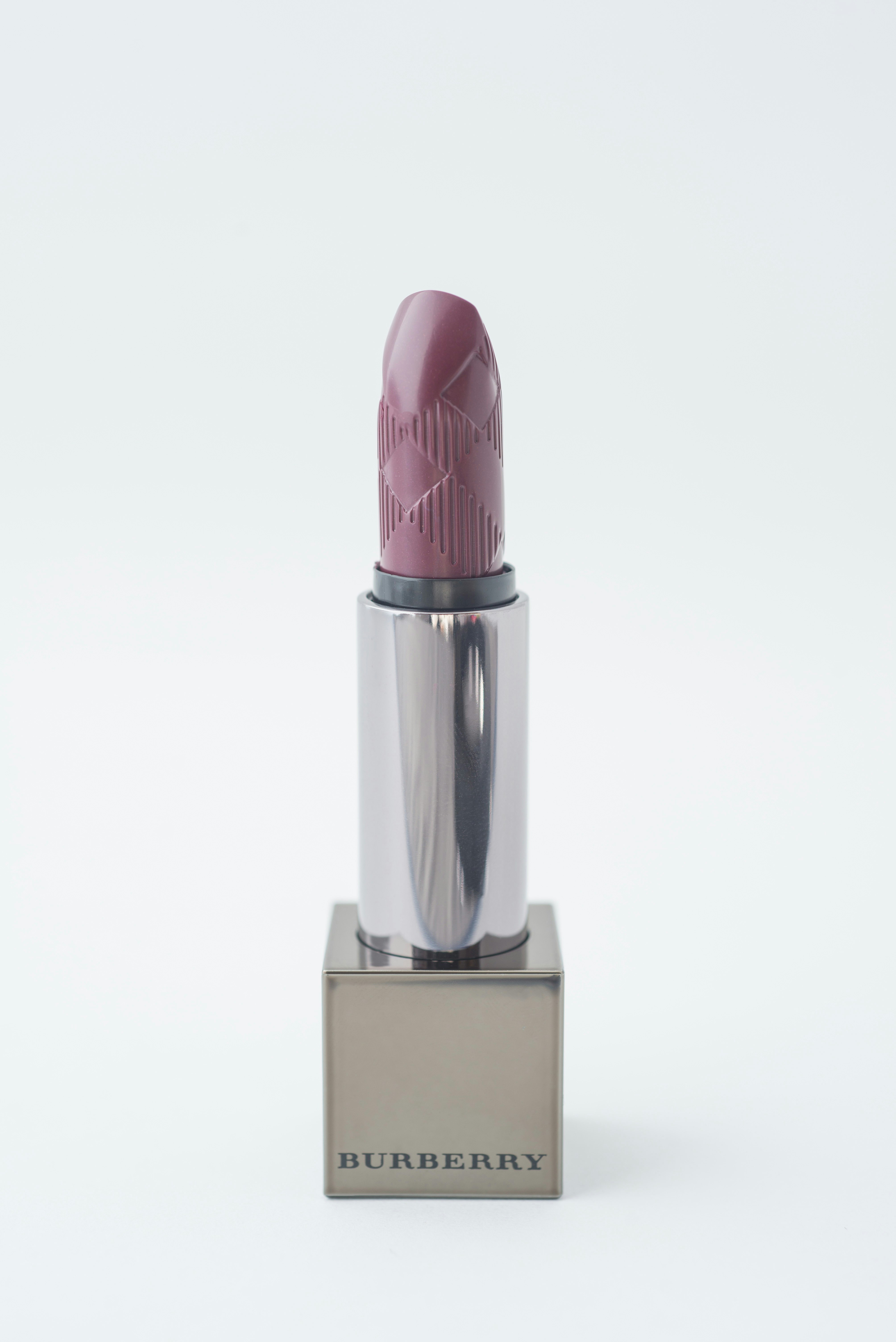 pink lipstick on white background
