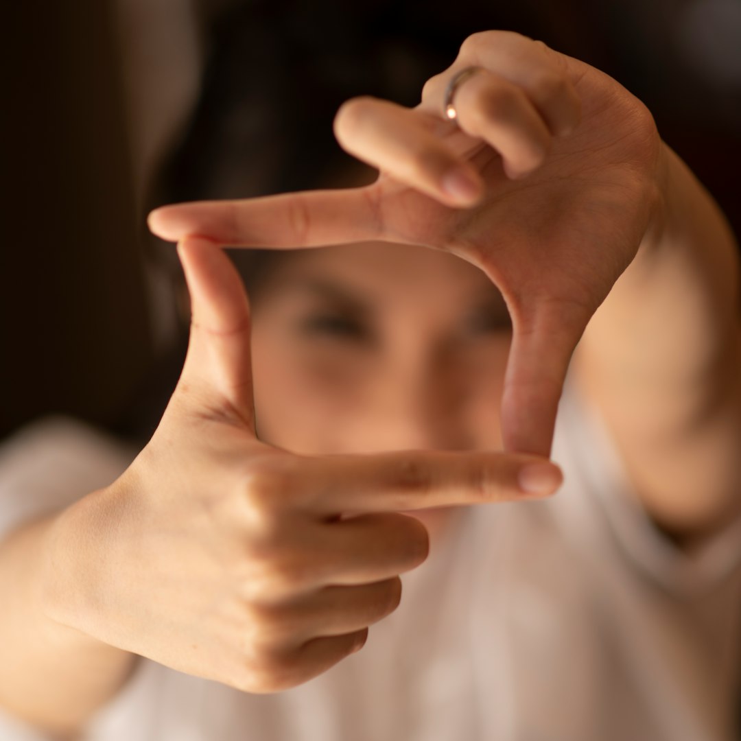 persons hand forming heart