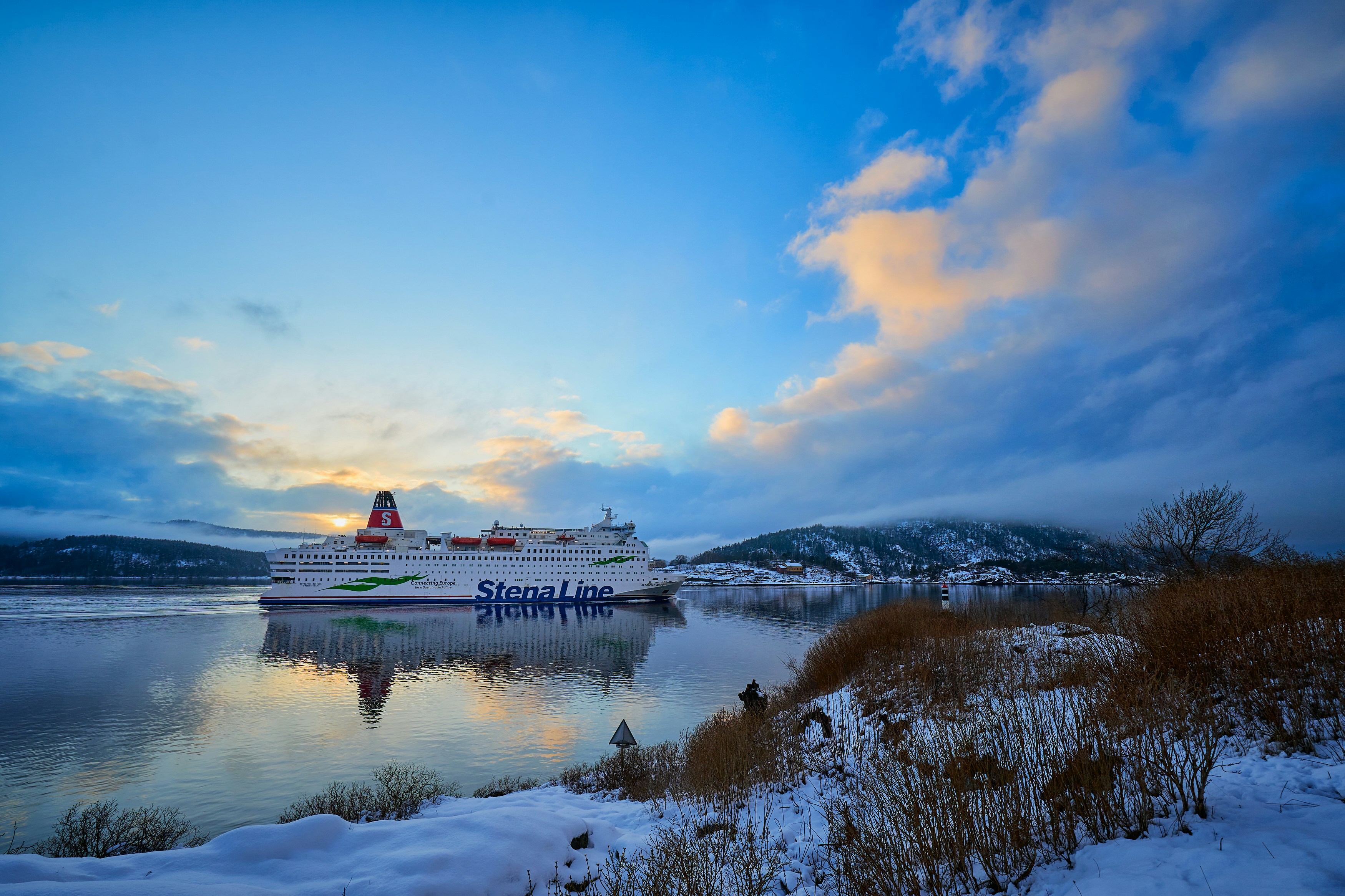 White and green ship on lake under blue sky during daytime photo – Free ...