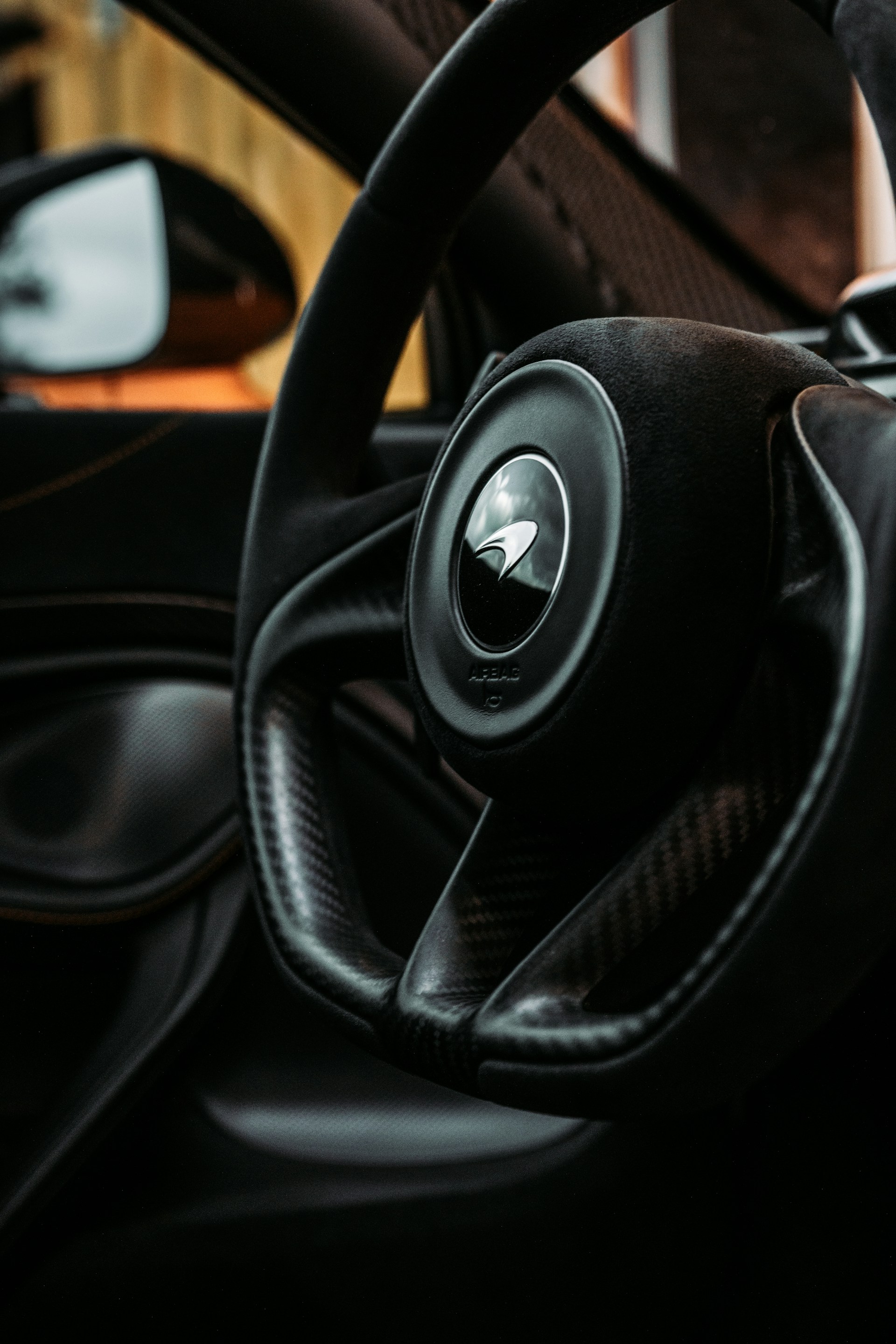 black and silver bmw steering wheel